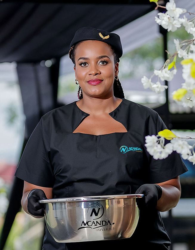 Ncanda-funeral-staff-memeber-helping-3-crop